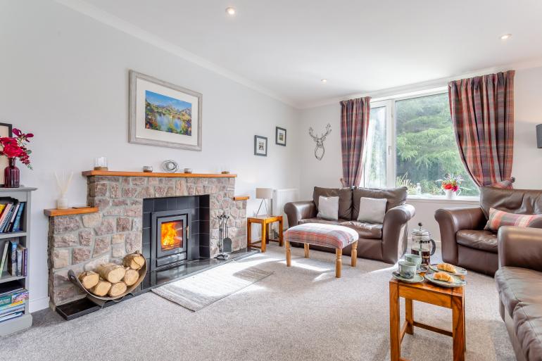 Foinaven House living room with wood burning stove